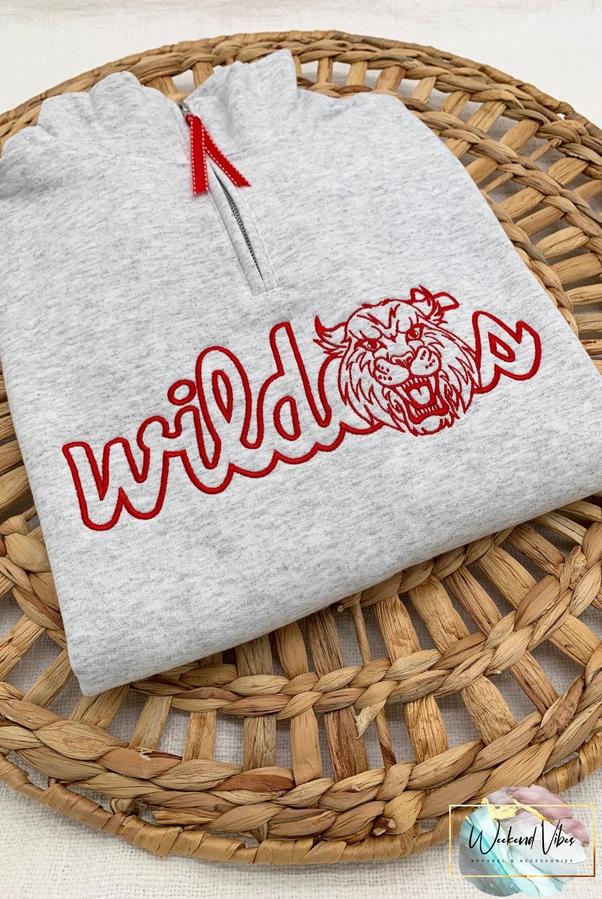 Gray 1/4 zip-up sweatshirt with embroidered red 'wildcats' design on chest