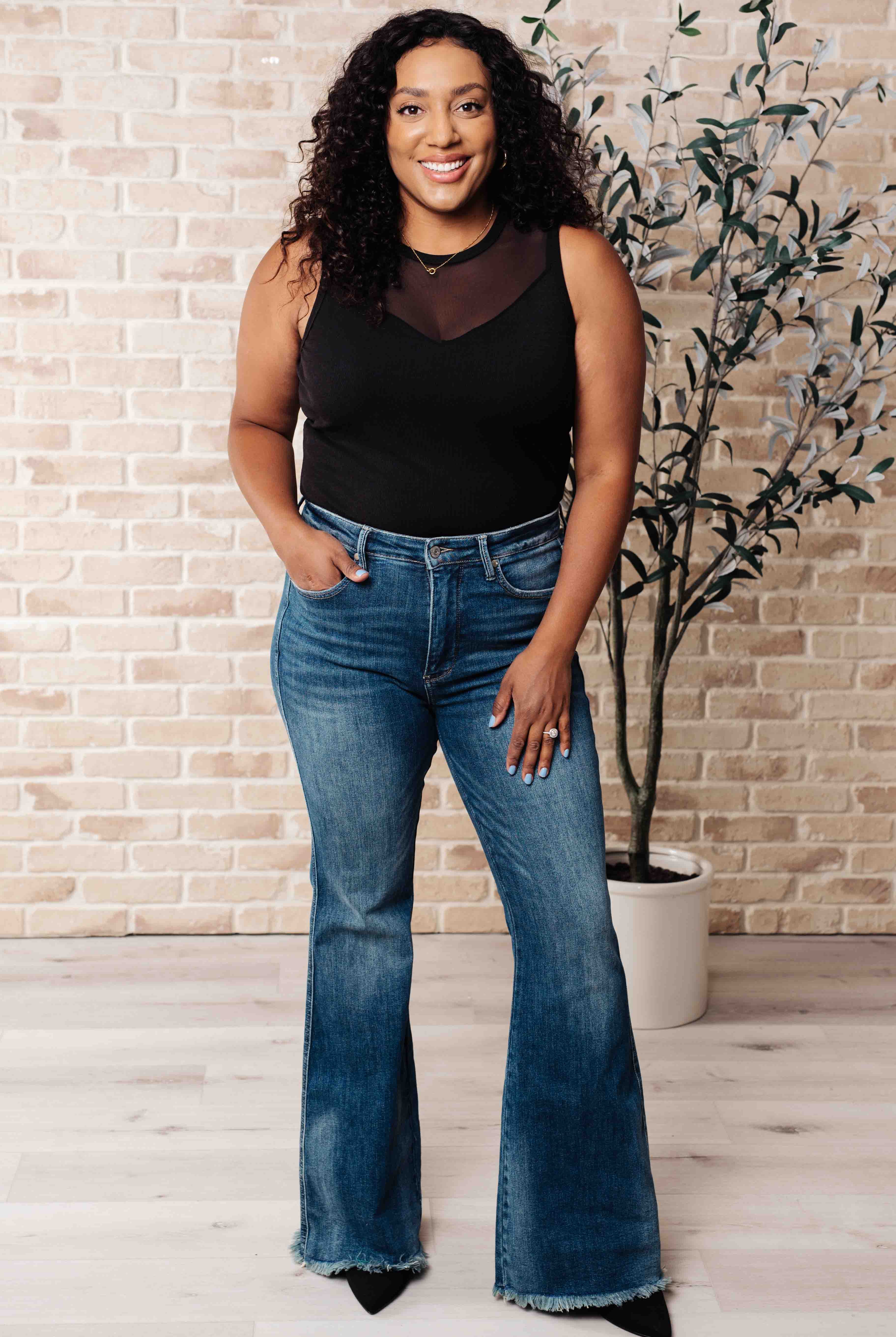 Miss You Much Sleeveless Black Mesh V-Neck Bodysuit styled with Flare Leg Judy Blue jeans