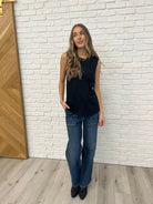 Black Sleeveless Top with diagonal pleats untucked with Judy Blue denim
