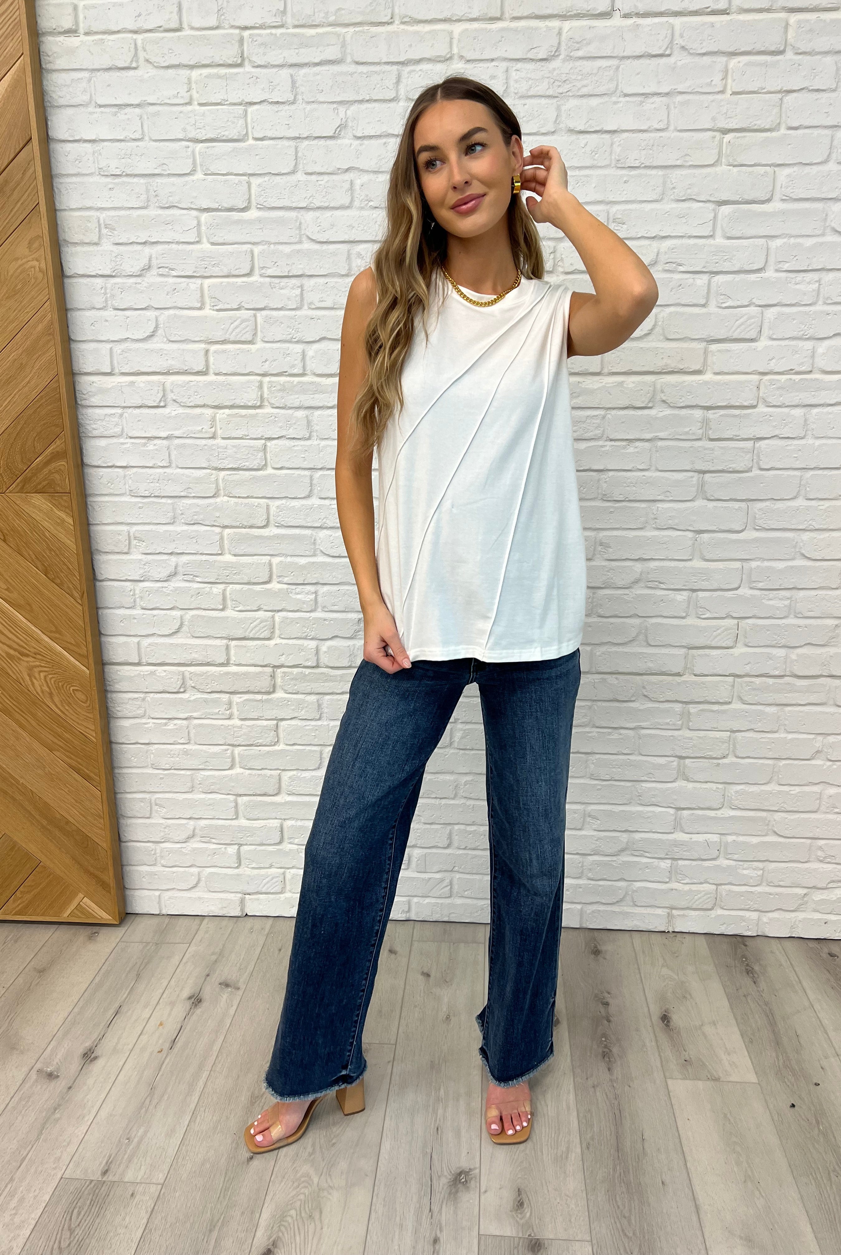 White Sleeveless Top with diagonal pleats  styled with Judy Blue jeans