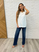 White Sleeveless Top with diagonal pleats  styled with Judy Blue jeans