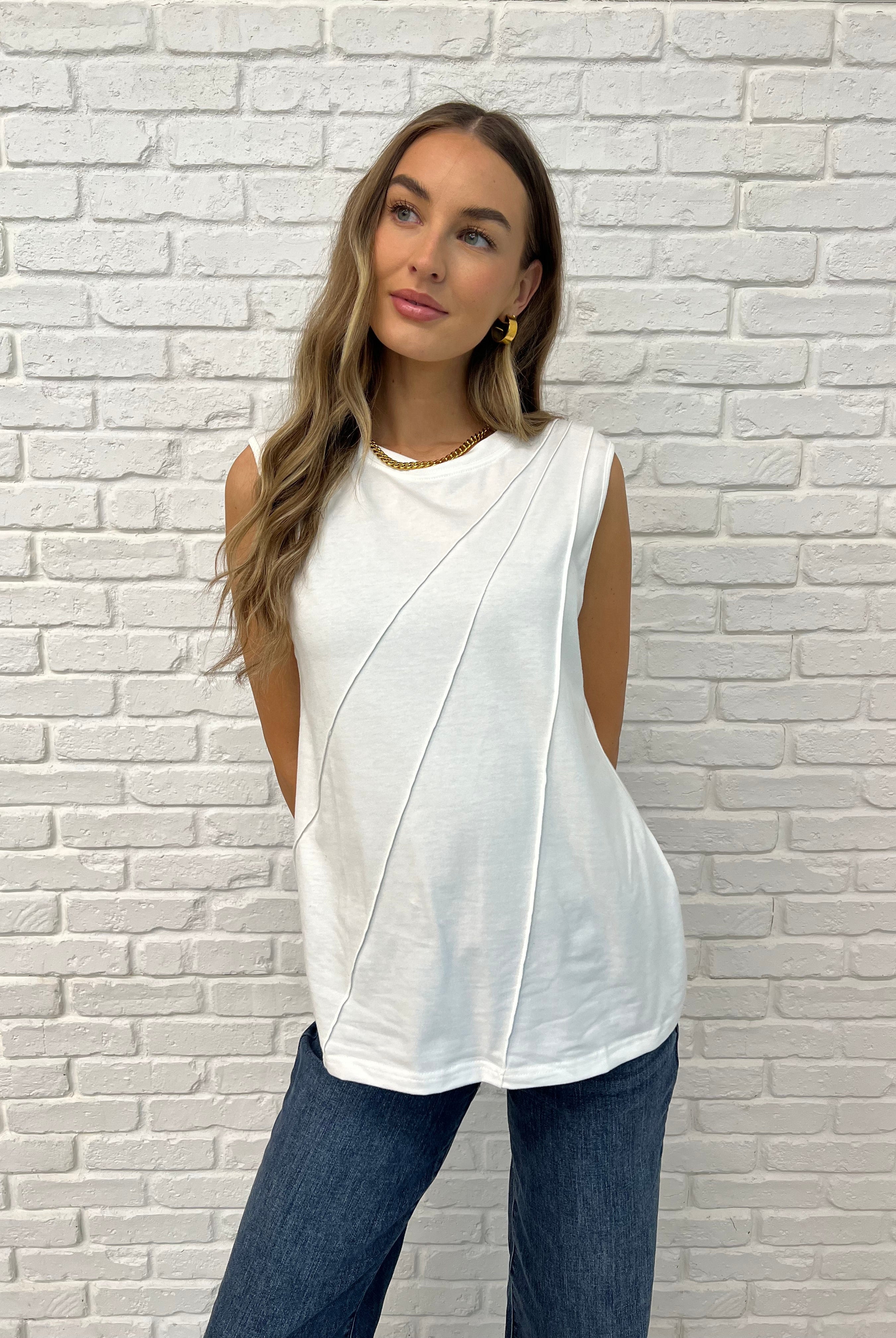 White Sleeveless Top with diagonal pleats on Casey size small