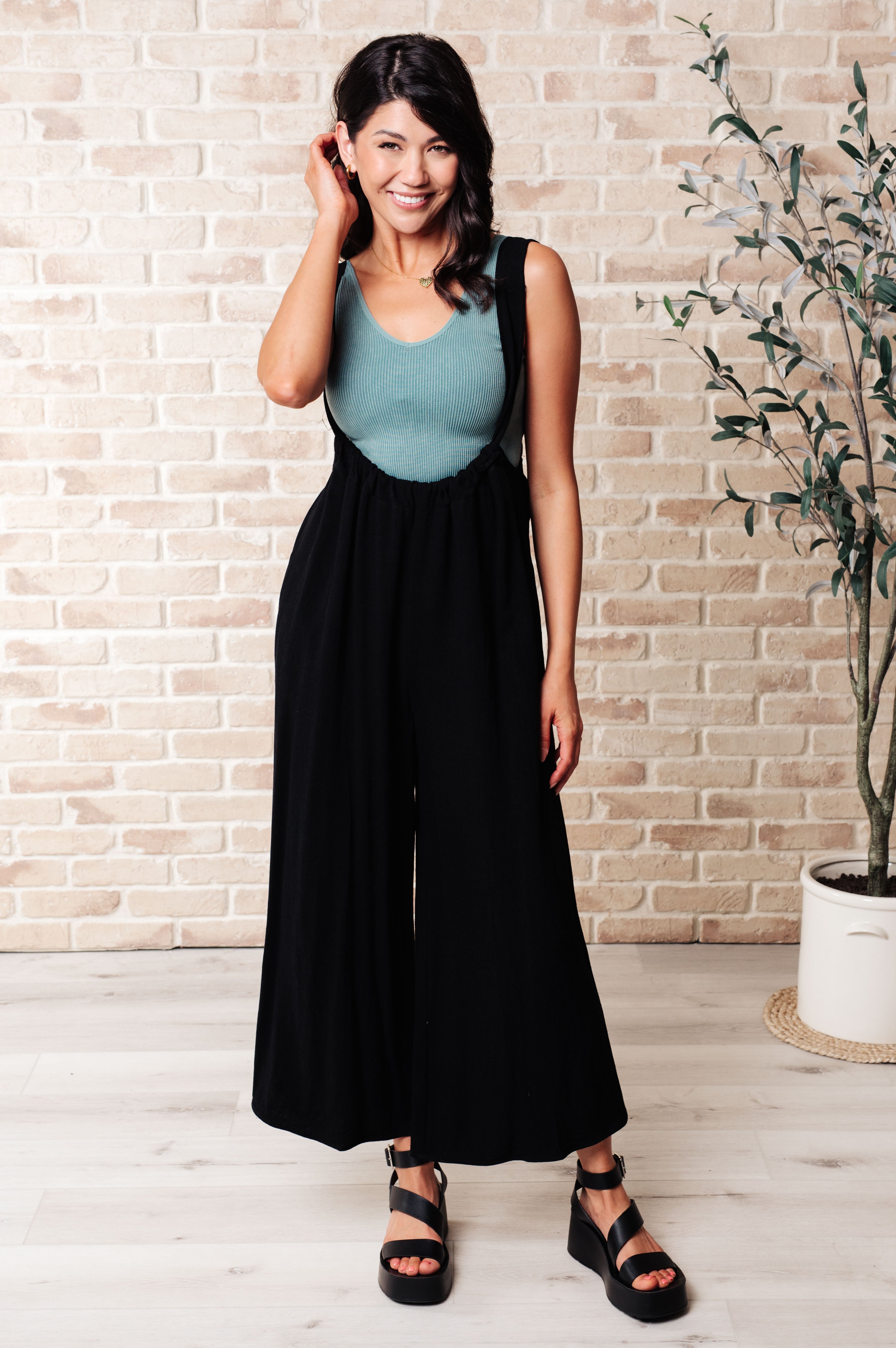 Something in the Way She Moves Jumper Black Sabrina wearing size small