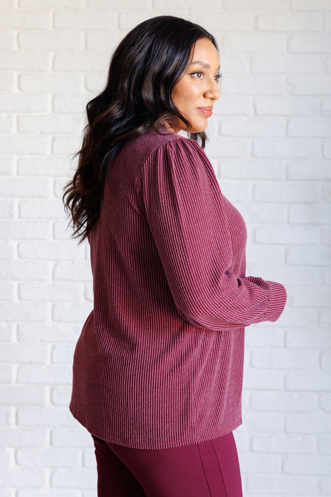 When the Sun Goes Down Mineral Wash Ribbed Knit Top in Wine showing sleeve detail on Krychele