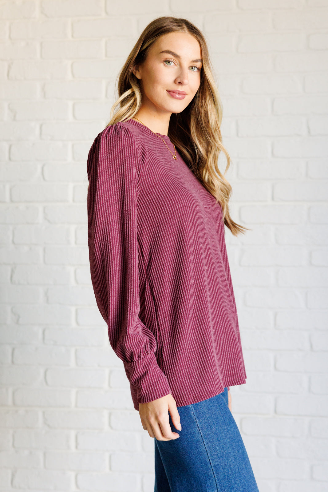 When the Sun Goes Down Mineral Wash Ribbed Knit Top in Wine side view on Casey