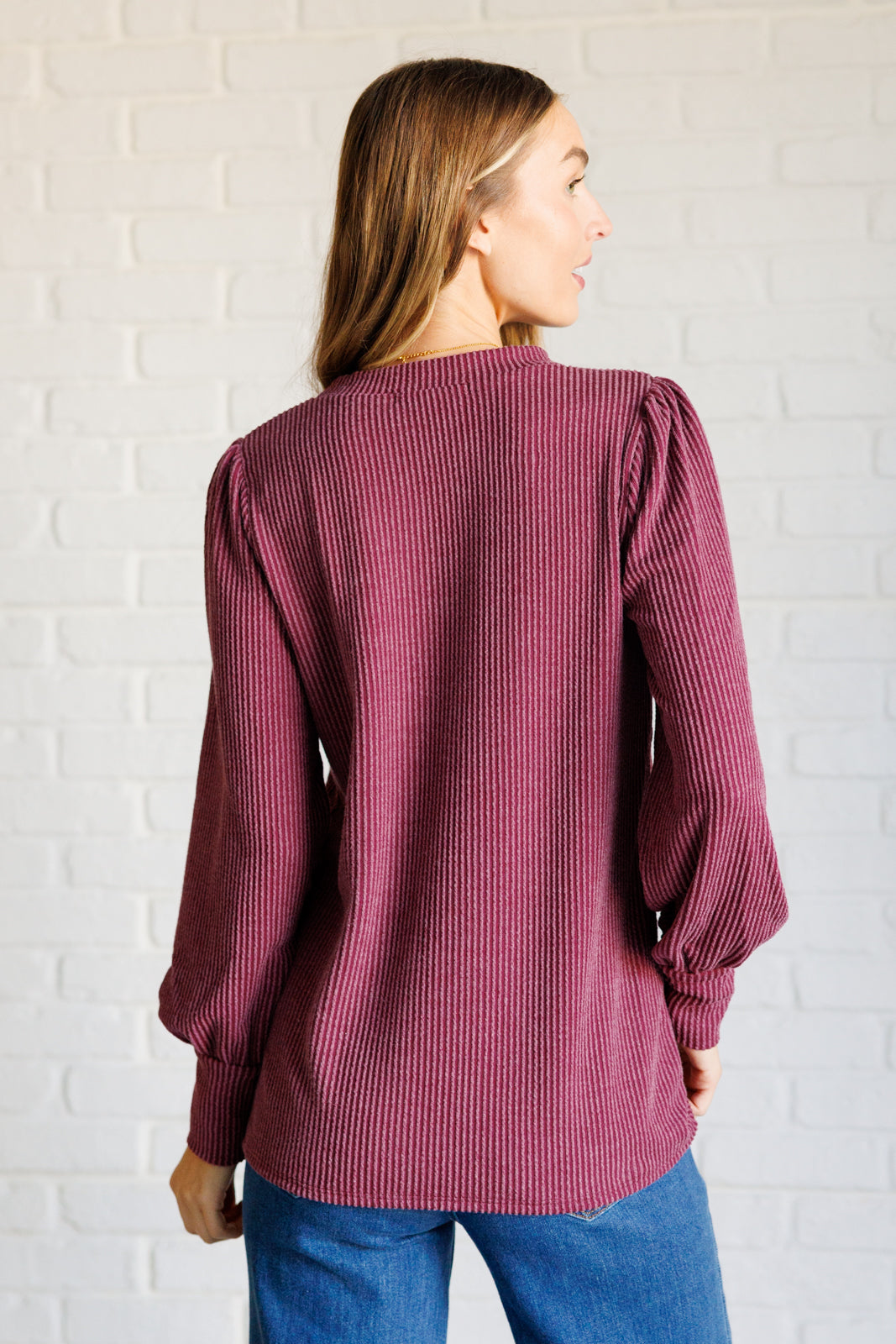 Back view of When the Sun Goes Down Mineral Wash Ribbed Knit Top in Wine on Casey