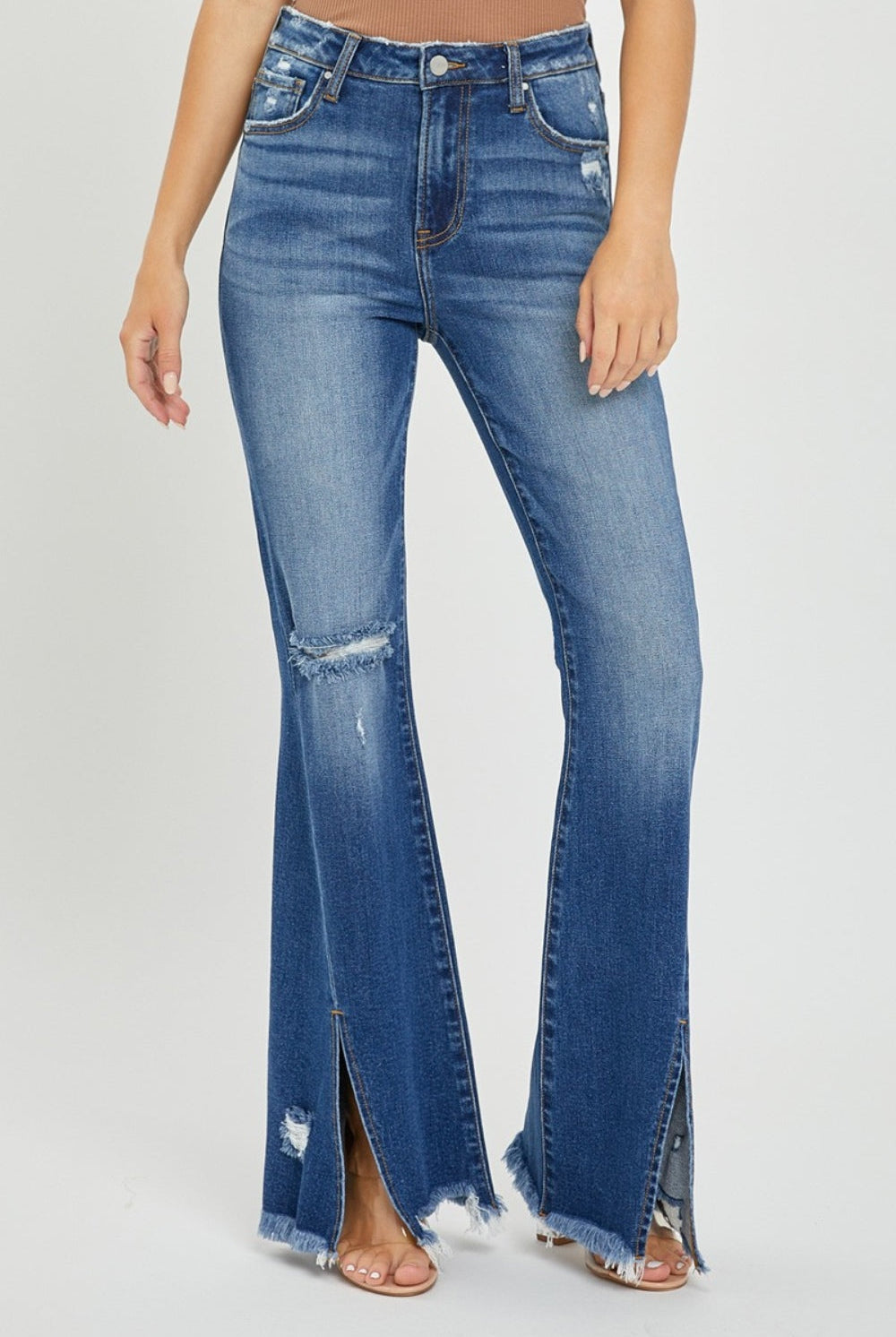 RISEN High Rise Front Slit Frayed Hem Flare Jeans in Dark Wash with knee distressing