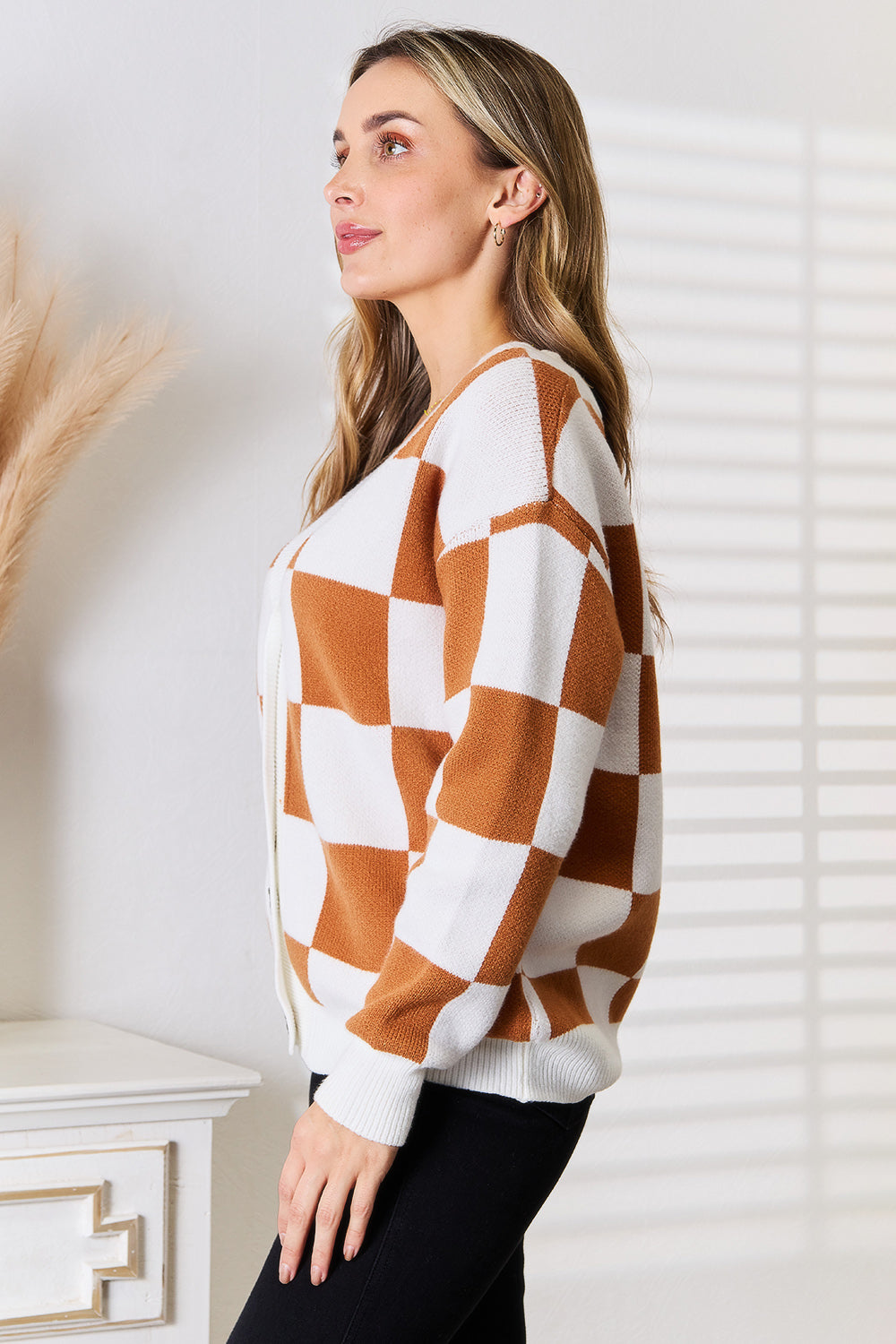 Side view of cardigan with long sleeves