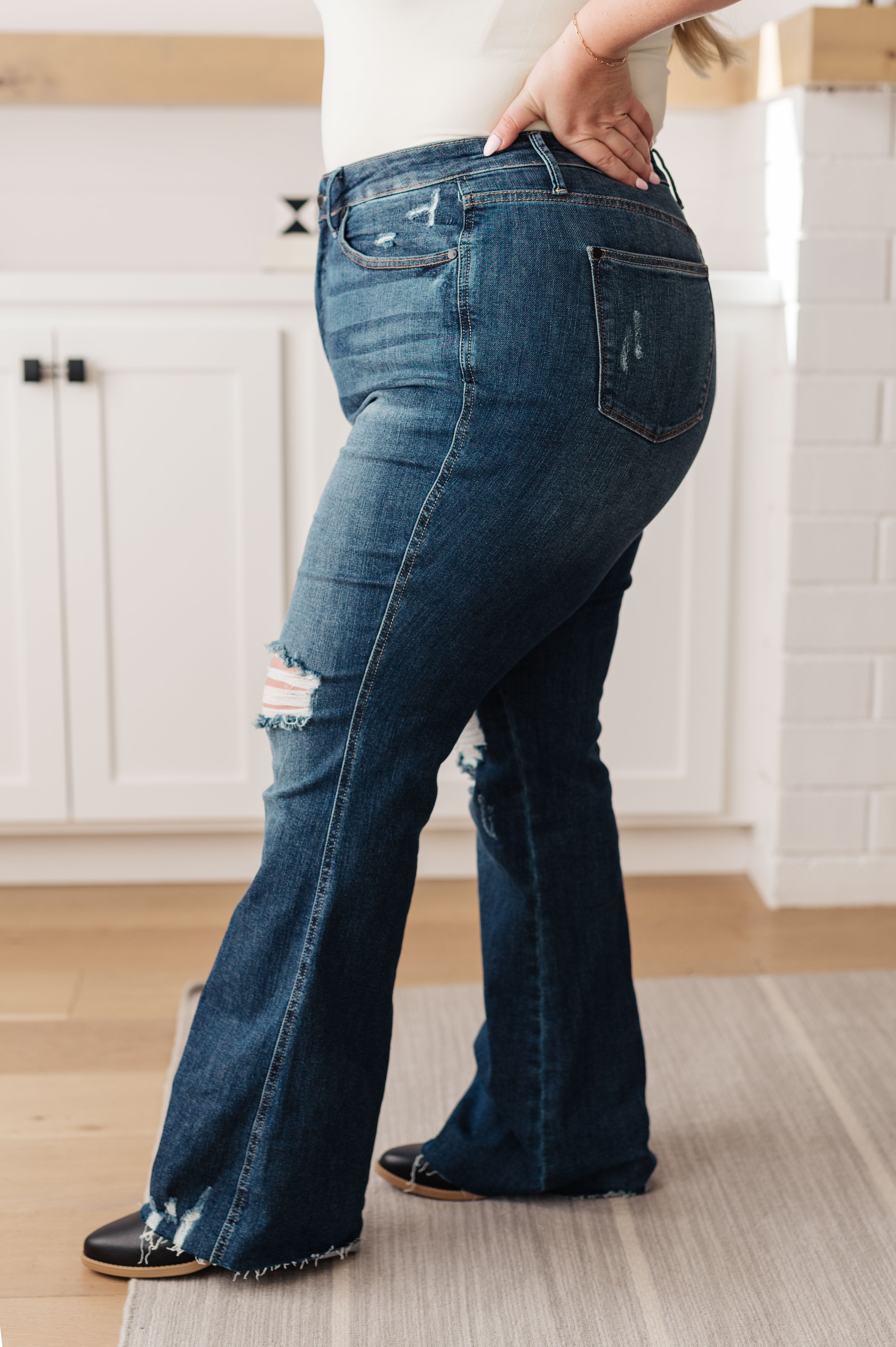 Judy Blue Control Top High Rise Distressed Cassandra jean side view with raw hem