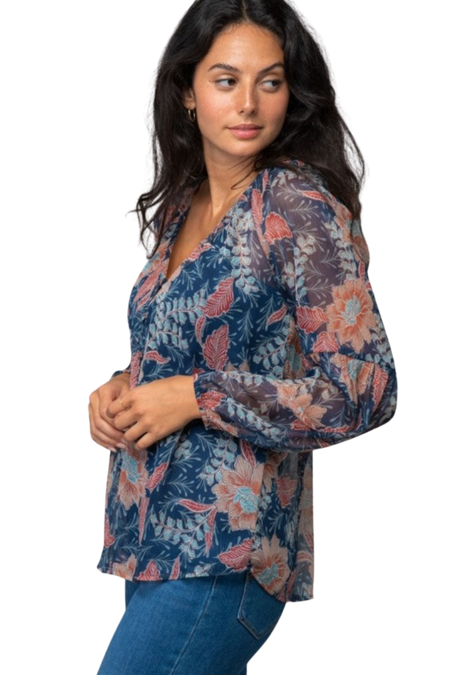 a woman in a floral shirt