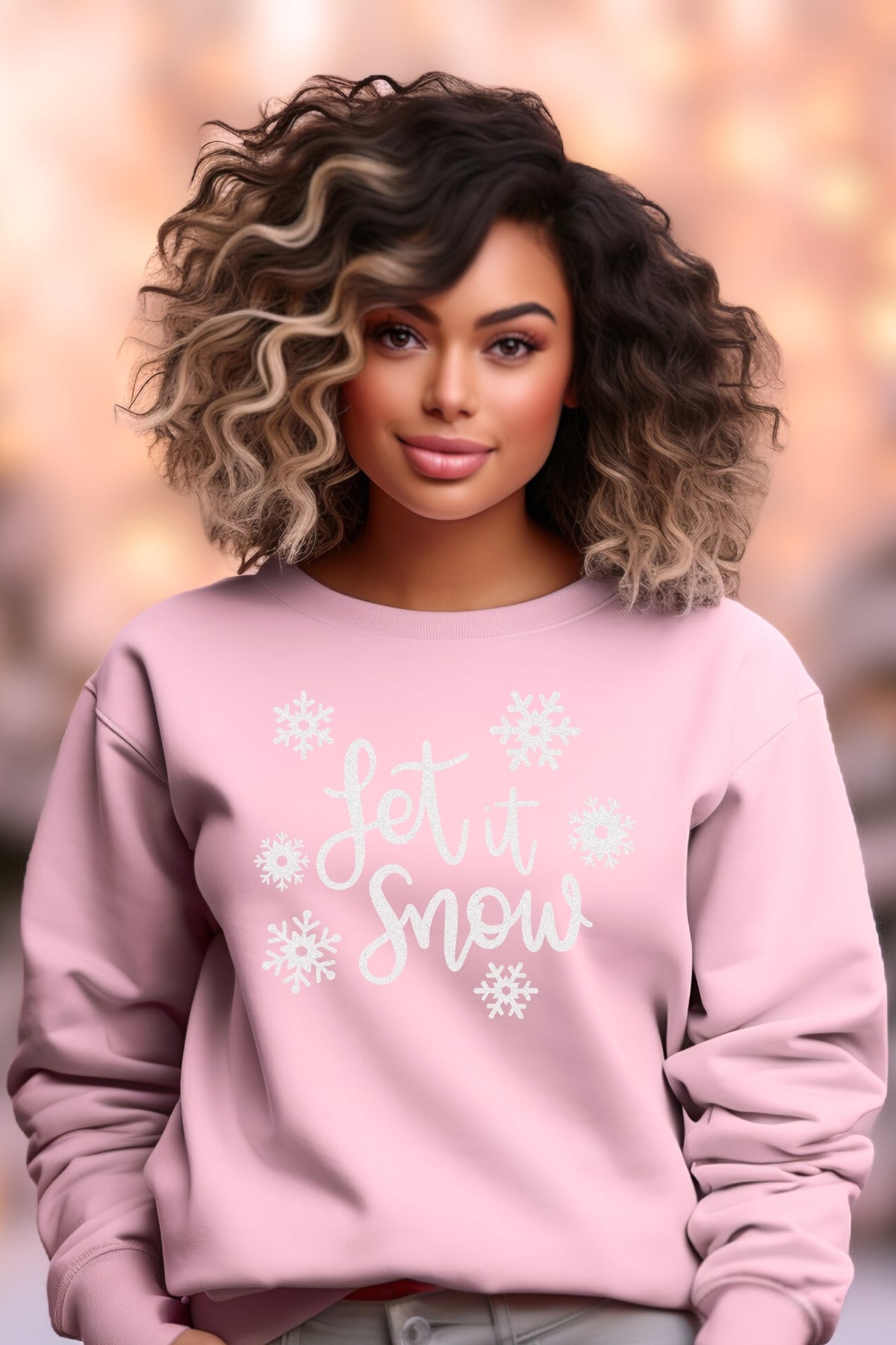 Let it Snow on pink pullover crewneck sweatshirt with white font and snowflakes