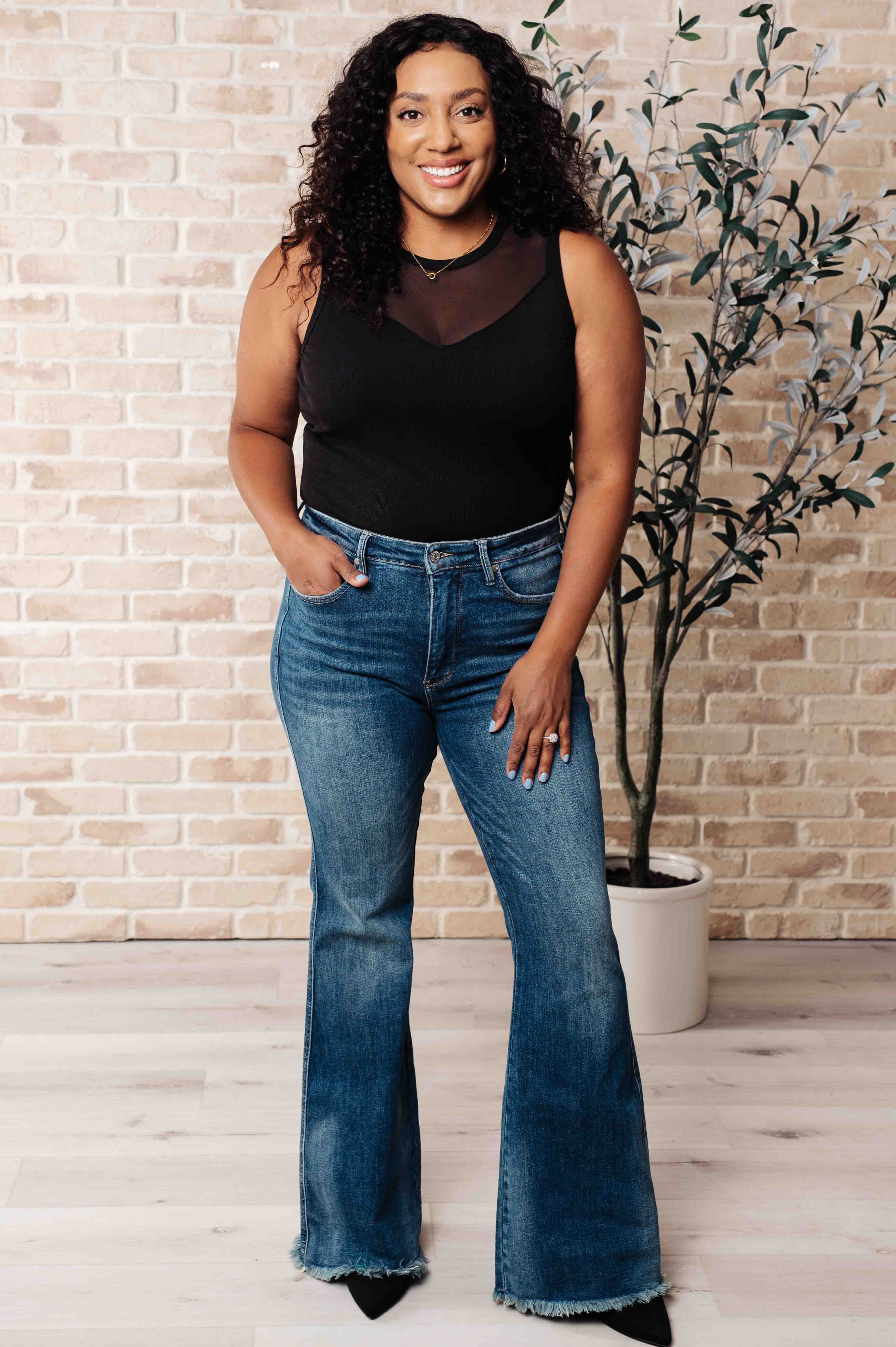 Miss You Much Sleeveless Black Mesh V-Neck Bodysuit styled with Flare Leg Judy Blue jeans