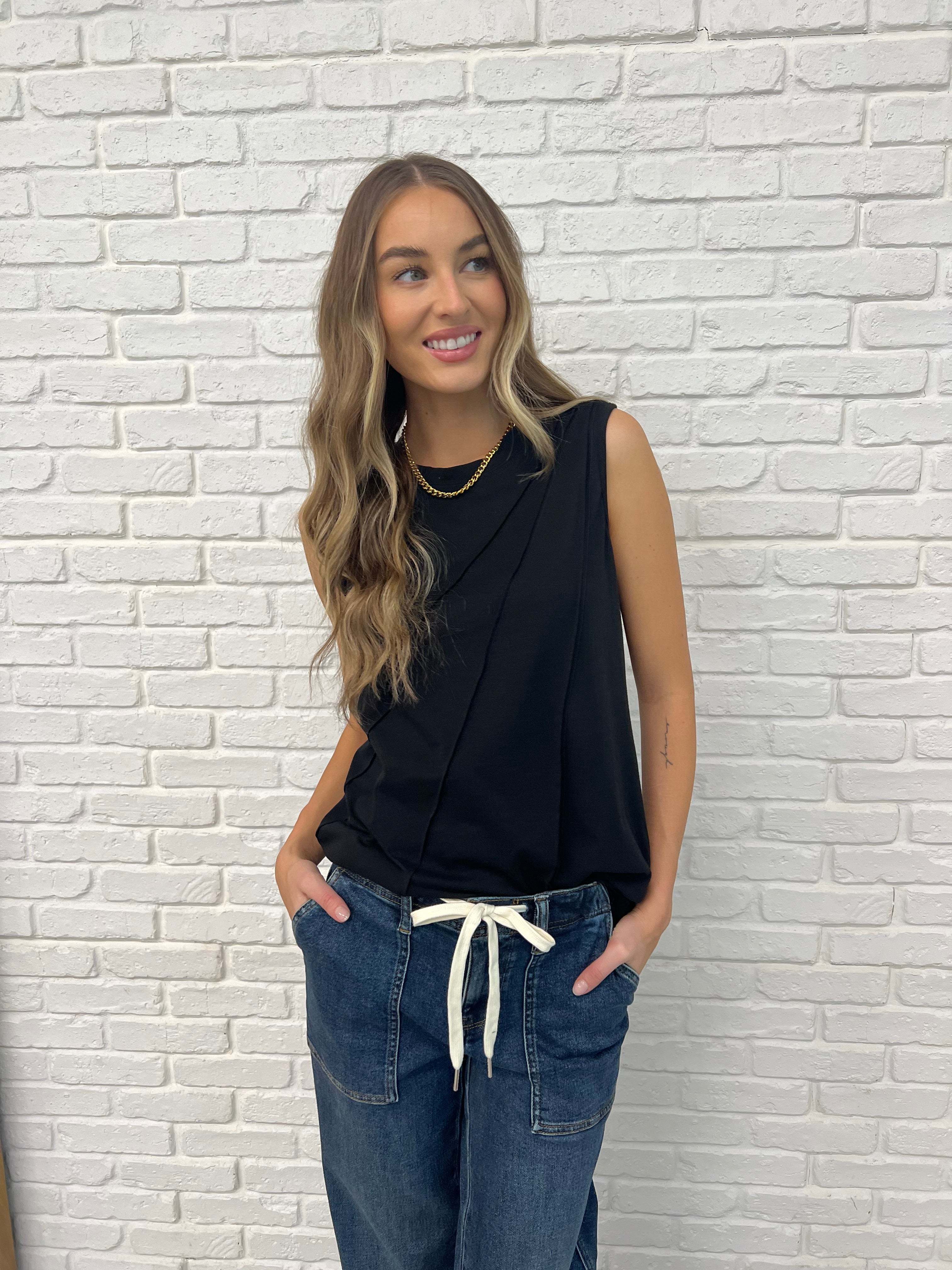 Blacl Sleeveless Top with diagonal pleats styled with Judy Blue joggers