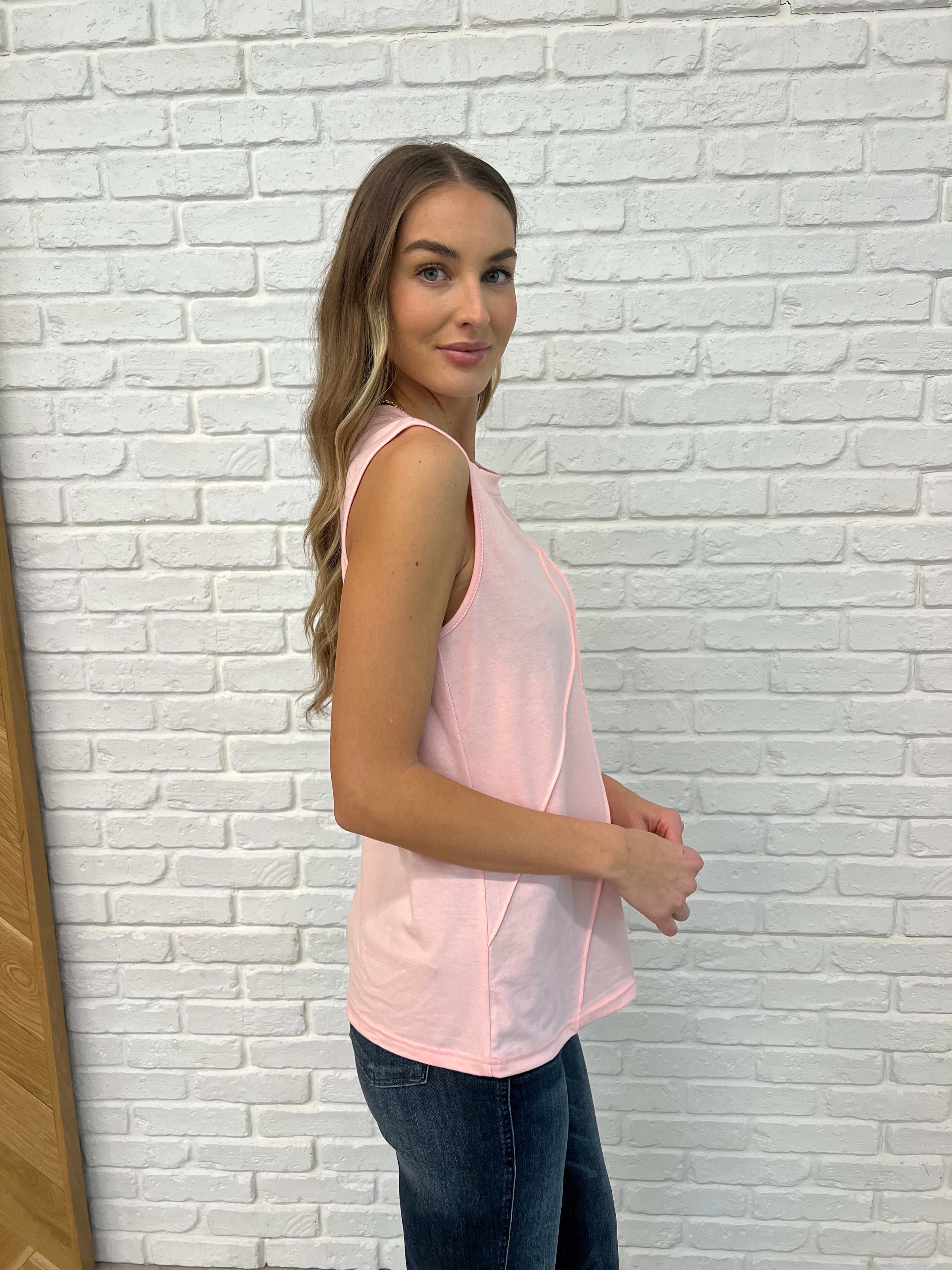 Pink Sleeveless Top with relaxed arm openings