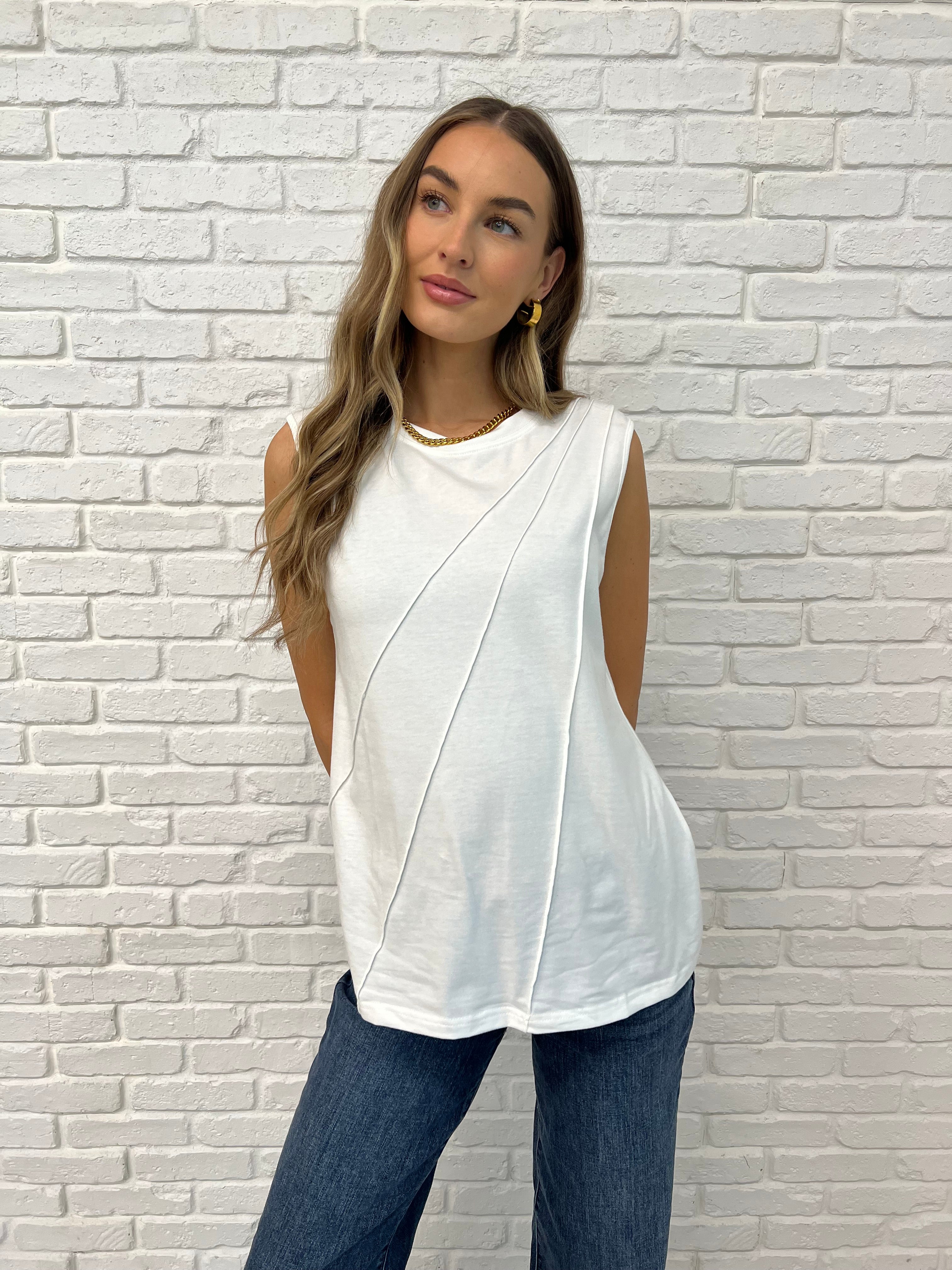 White Sleeveless Top with diagonal pleats on Casey size small