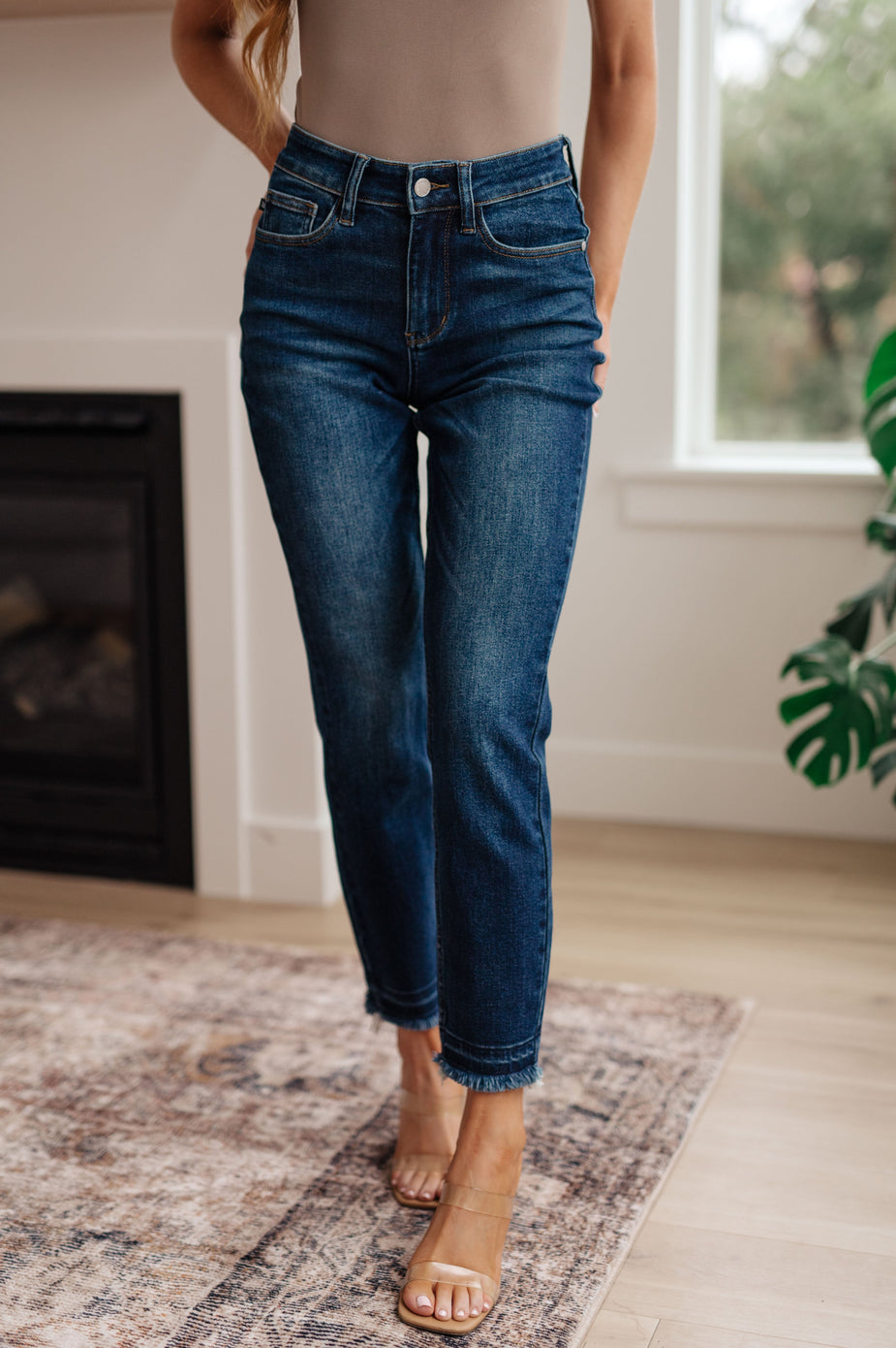 a woman wearing blue jeans