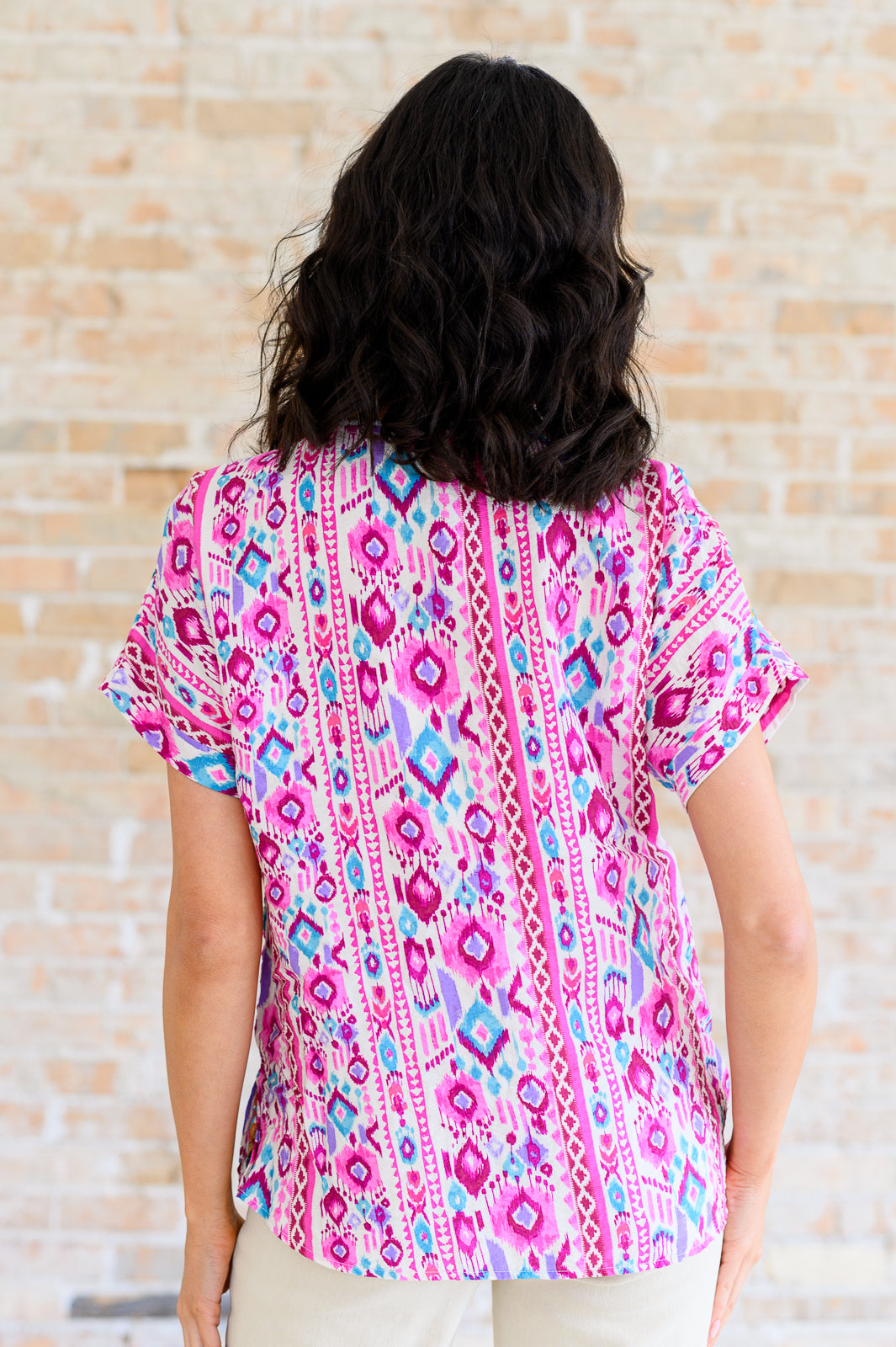 Back view of Yours Truly, V-Neck Top in Magenta by Savanna Jane