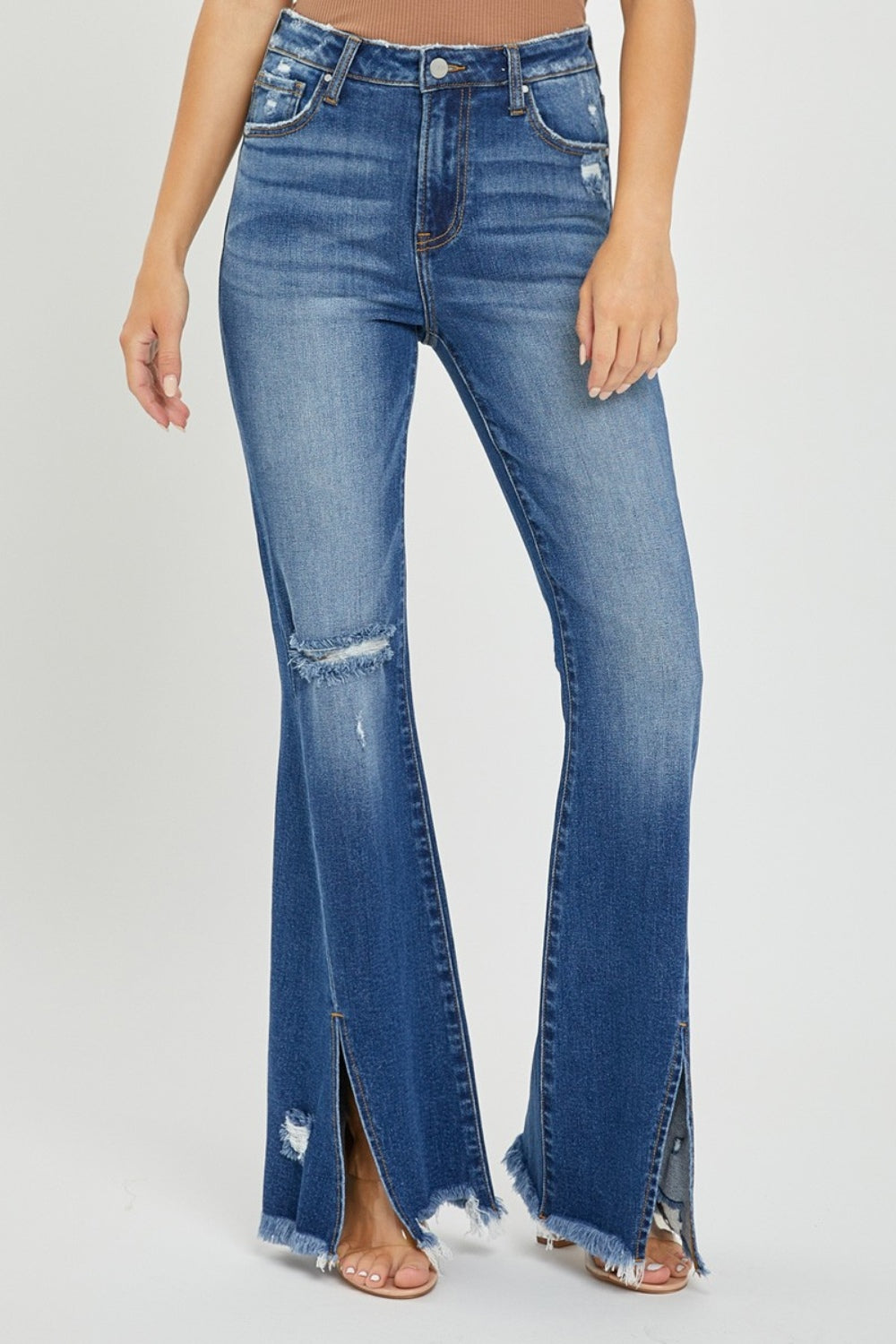 RISEN High Rise Front Slit Frayed Hem Flare Jeans in Dark Wash with knee distressing